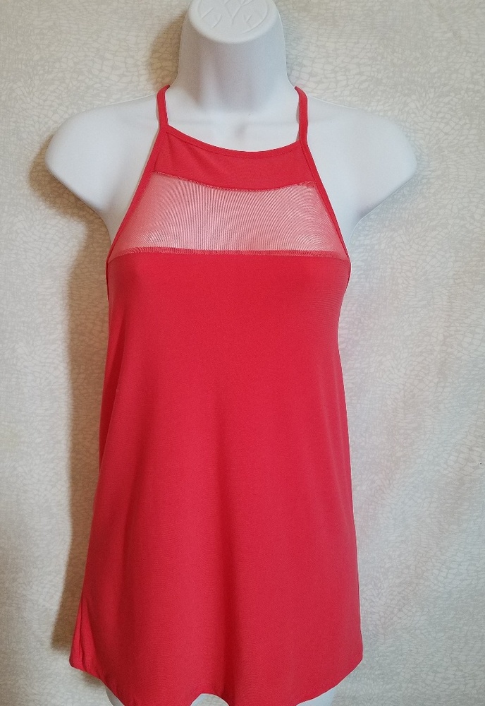 Coral color sleeveless halter w/ criss cross back